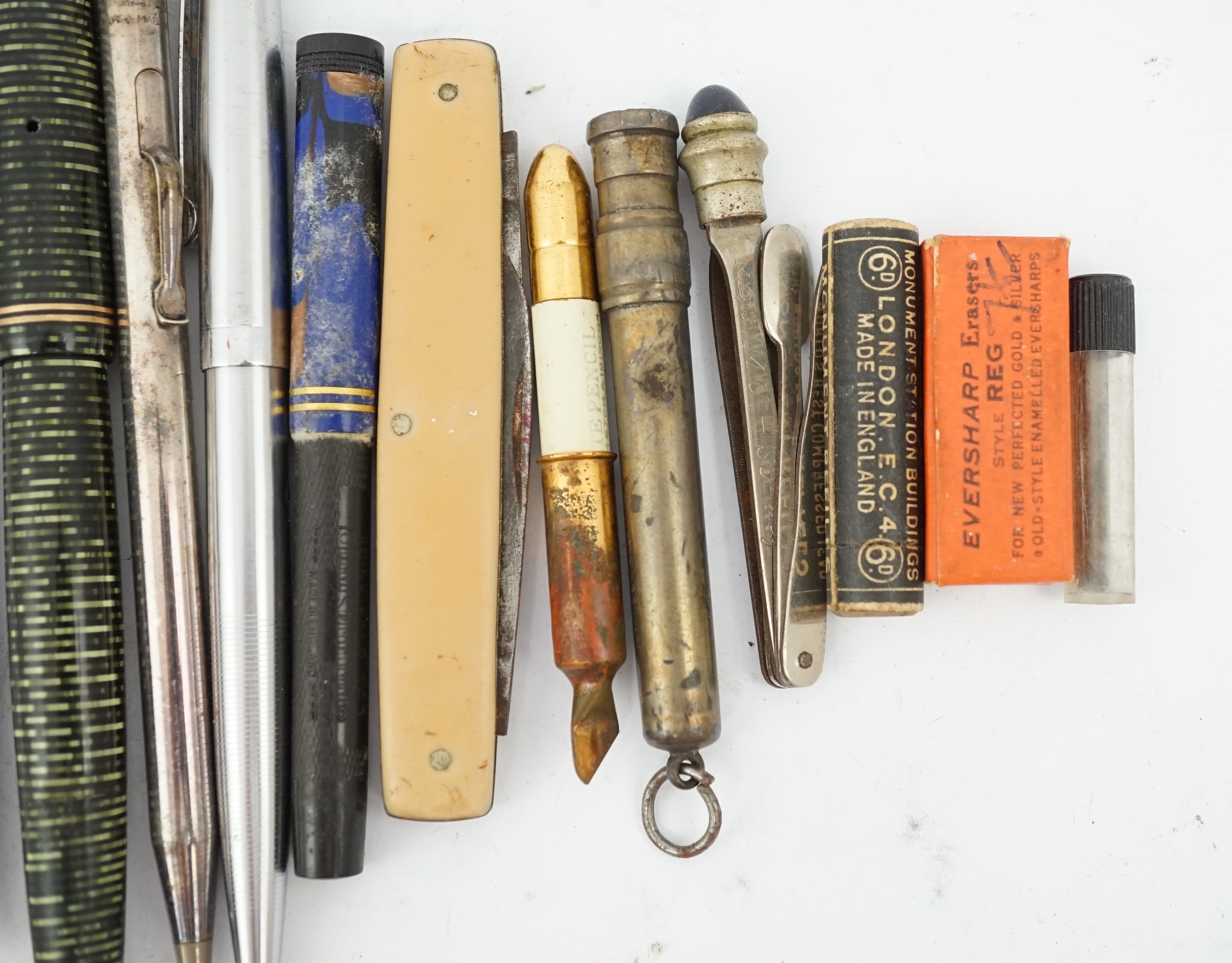 A collection of pens, pencils and stationery equipment, including a Parker Vacumatic